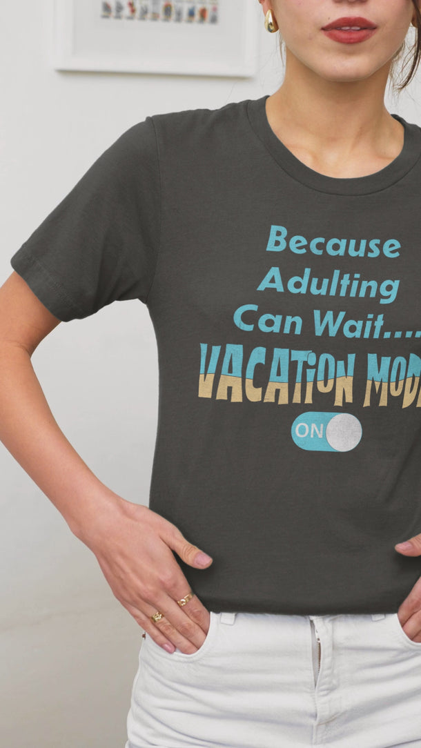 Because Adulting Can Wait....Vacation Mode On Tee - Vacation Art Boutique. A young lady wearing a Black T-shirt with the caption "Because Adulting Can Wait...Vacation Mode On".